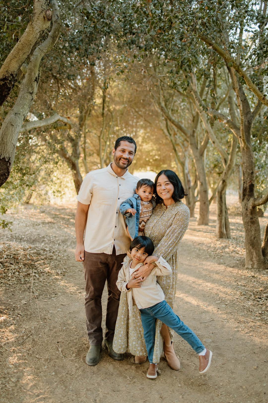 Ayaka with her family enjoying time outdoors in a beautiful wooded setting